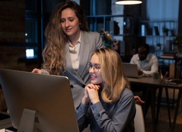 Analysts reviewing organic search and AI citation performance